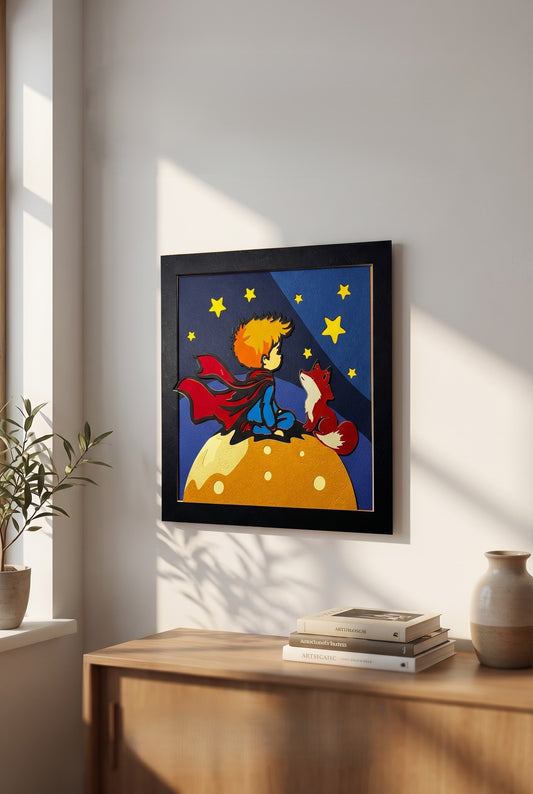 3D shadow box dekoracija Malog Princa okačena na zid iznad komode – prikaz u enterijeru